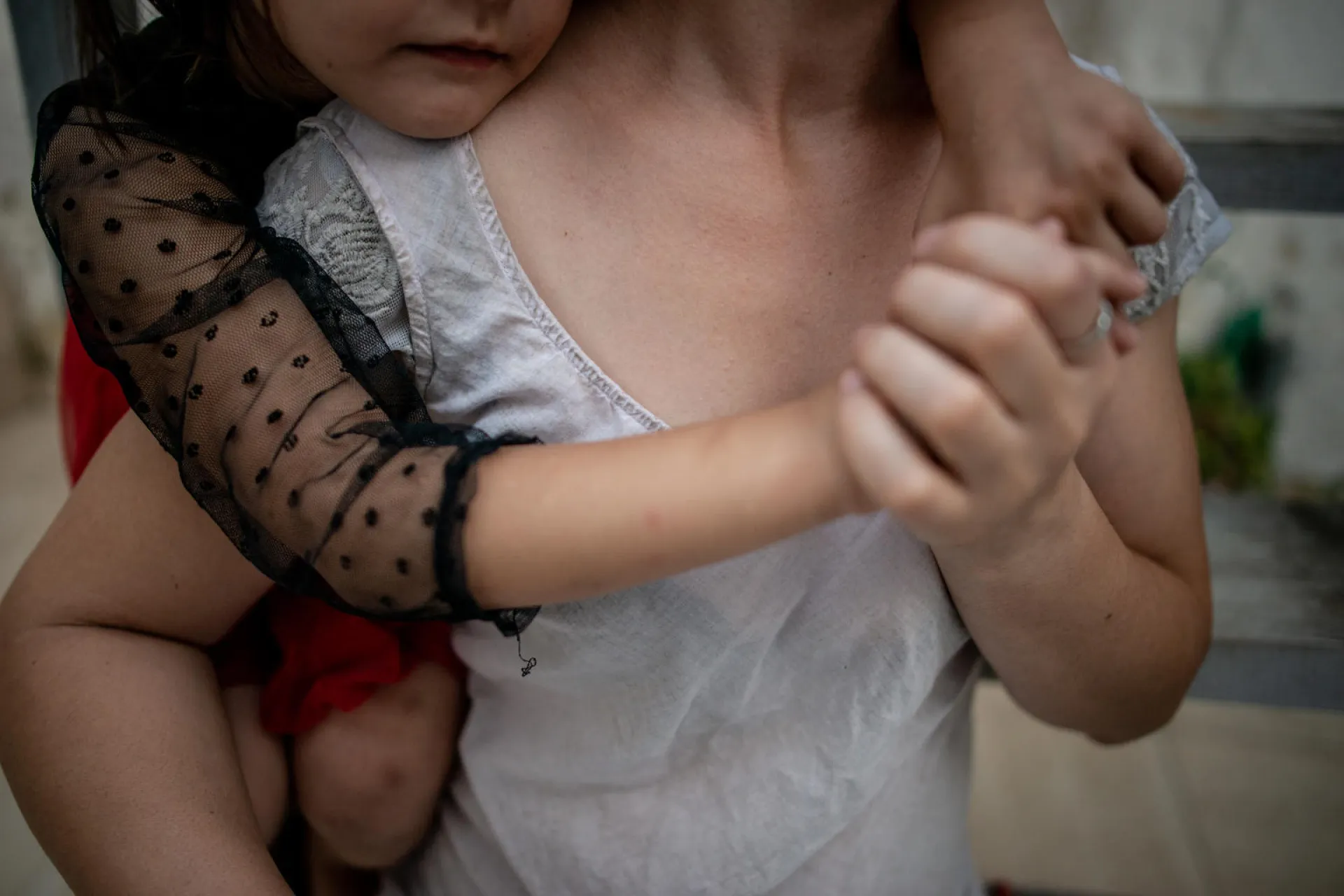 Mother and daughter embrace